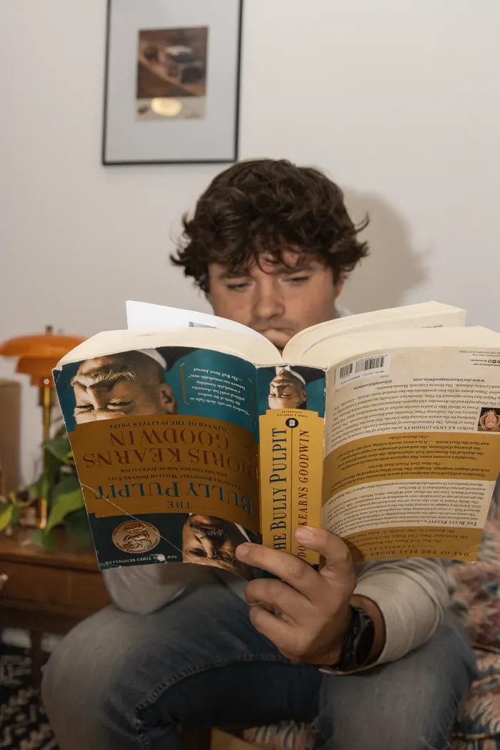 A member reading during Book Studies