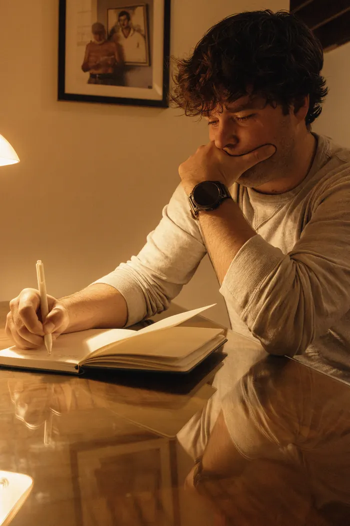 A member writing during Write Night